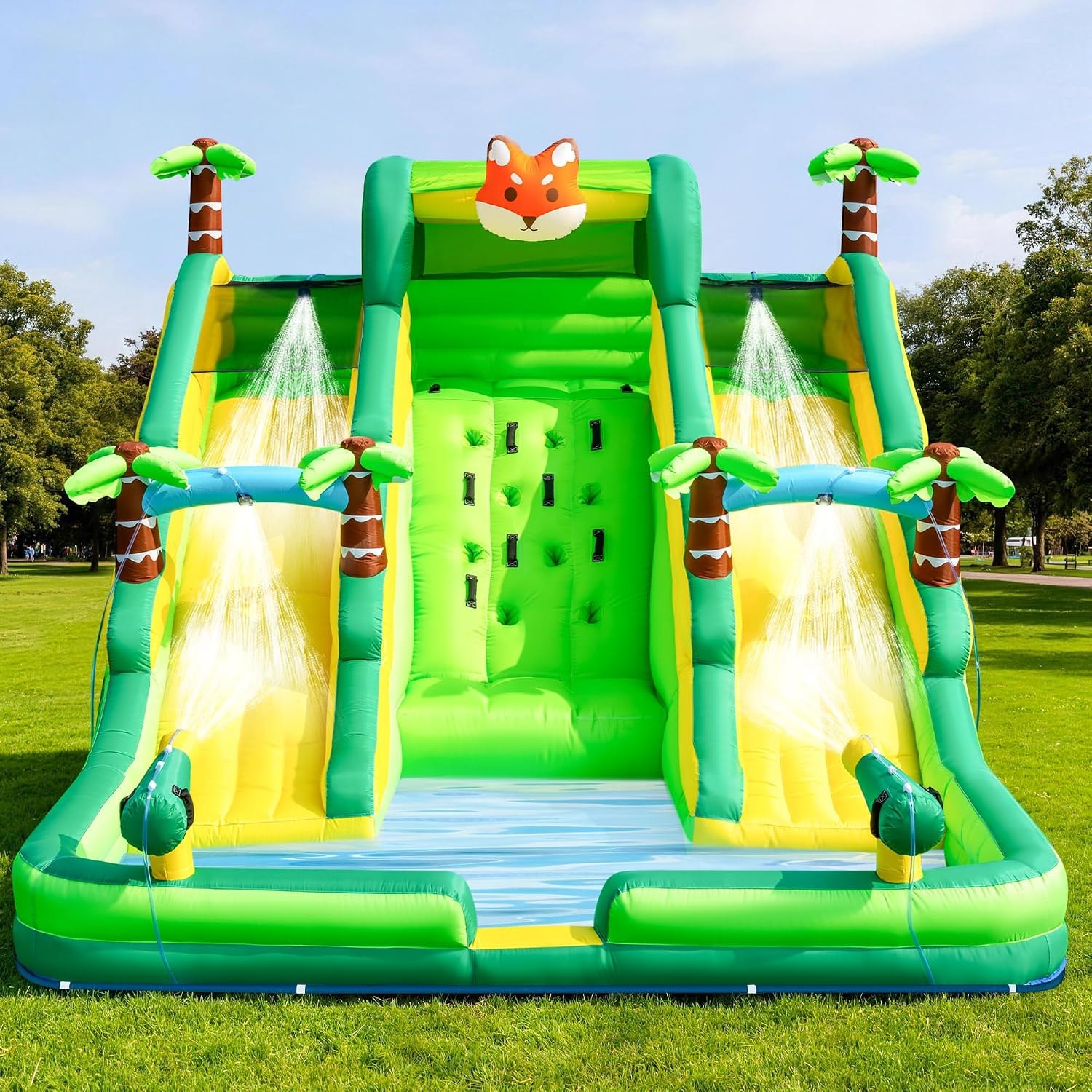 Tropical Fox water slide set up on grass with sprinklers running